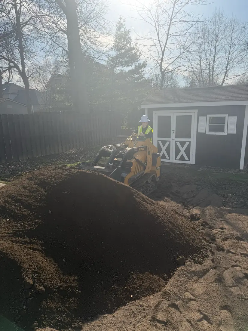 Loading dirt and debris after dark