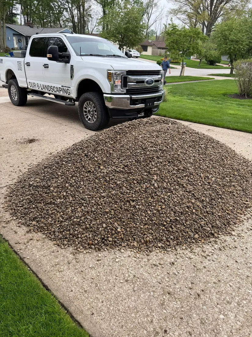 Fresh gravel delivered for a stone driveway refresh